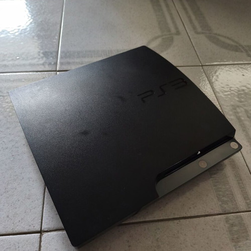 Sony PlayStation 3 Slim console like new with 2 games and cables