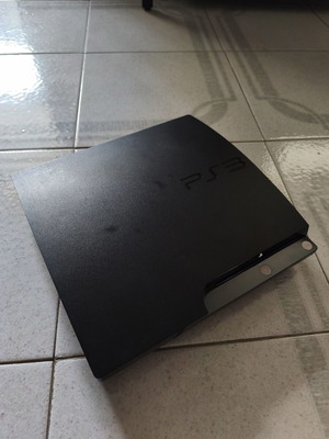 Sony PlayStation 3 Slim console like new with 2 games and cables