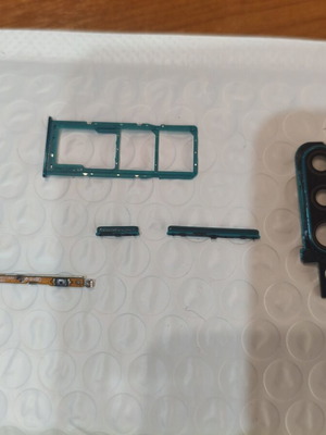 Samsung Galaxy A30s spare parts like new, volume buttons, sim tray, camera glass