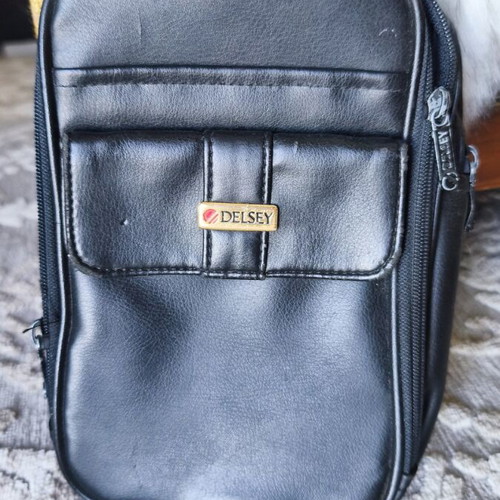 Delsey leather bag like new, black handheld