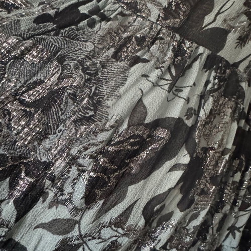 Short sleeveless dress with silver thread, like new, size M