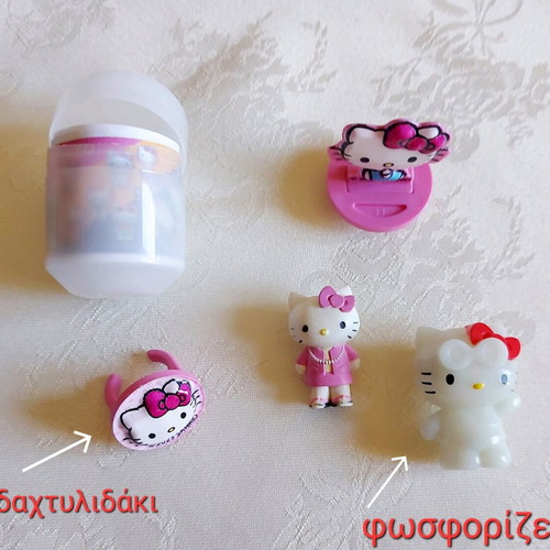Hello Kitty figures like new, pack with capsules and cards