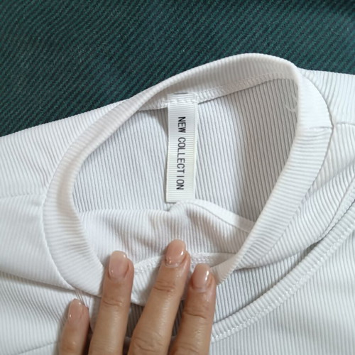 White crop top rib fabric with asymmetric chest opening like new, size S