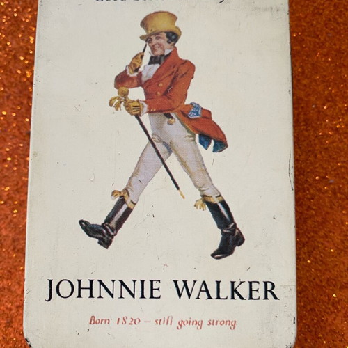 Johnnie Walker collectible playing cards in metal box used