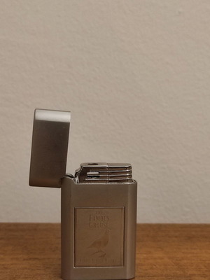 The Famous Grouse lighter used collectible