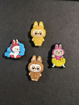 Labubu Crocs Charms set like new, multicolored and yellow