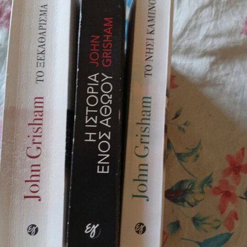 John Grisham books used, The Island Camino, The Reckoning, The Innocent