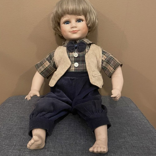 Porcelain collectible boy doll like new, 43 cm tall with fabric clothes