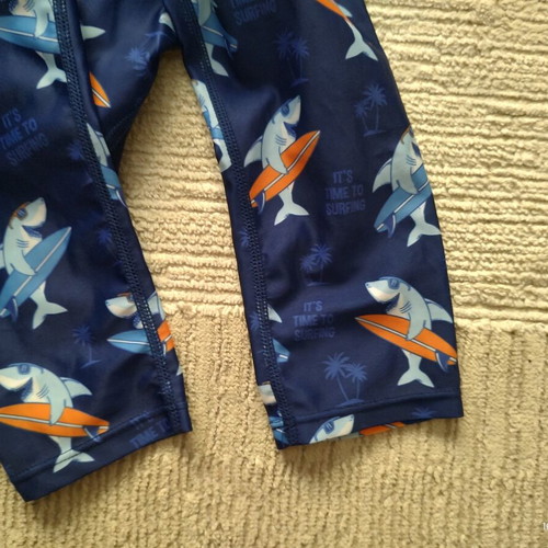 Children's full-body rashguard swimsuit with sharks, size 140