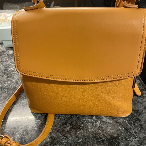 Chantal backpack bag used, orange with 2 straps and handle