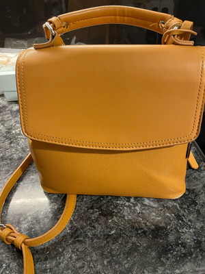 Chantal backpack bag used, orange with 2 straps and handle