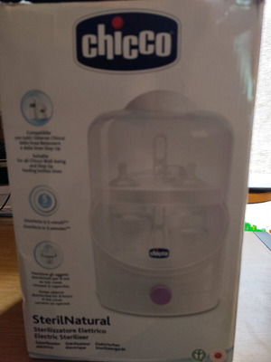 Chicco electric steam steriliser used with 6 bottle slots