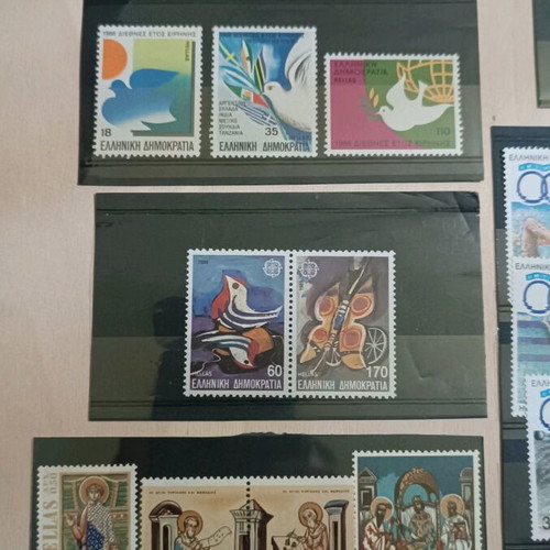 Greek stamps MNI new, 12 unsealed sets