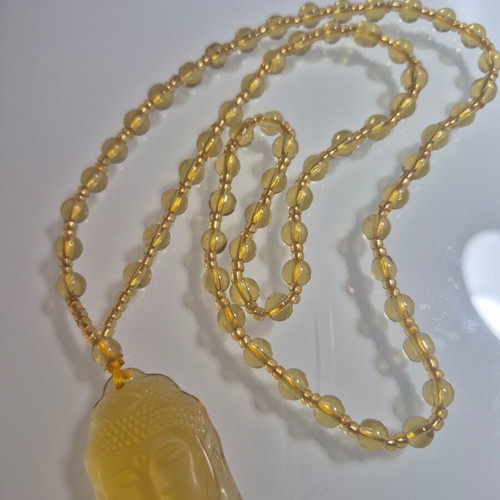 Buddha Necklace new, yellow sun color
