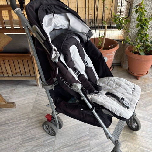 Maclaren Techno XLR stroller used with accessories and carrycot
