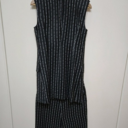 Peace and Chaos set like new, black vest and pants with white stripe