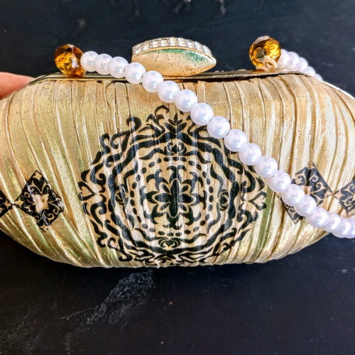 Clutch handbag refurbished, gold color