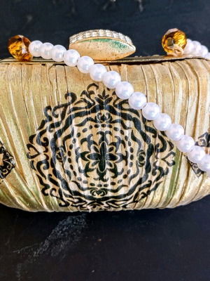 Clutch handbag refurbished, gold color