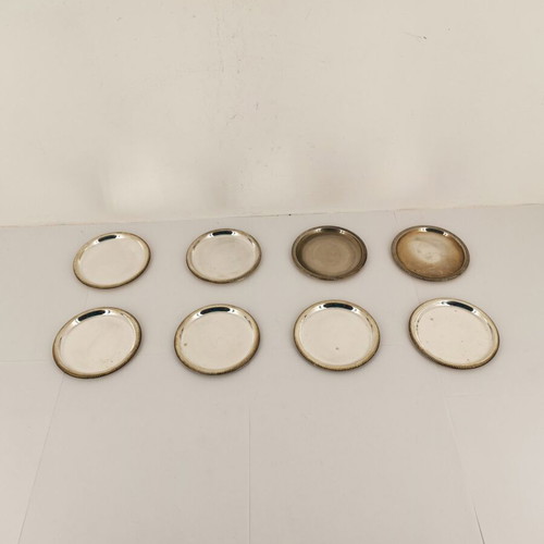 Set of 8 used metal coasters