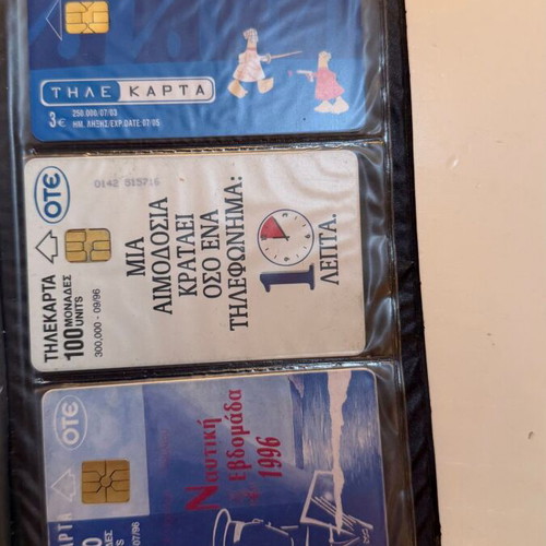 Vintage OTE phone card collection in black album