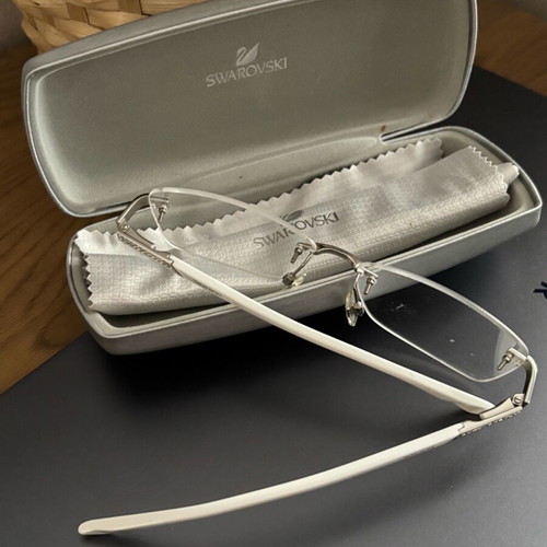 Swarovski women's eyeglasses new, white with crystals