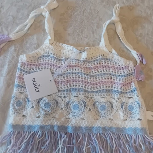 Set for 8-year-old girl with knitted top and cotton shorts