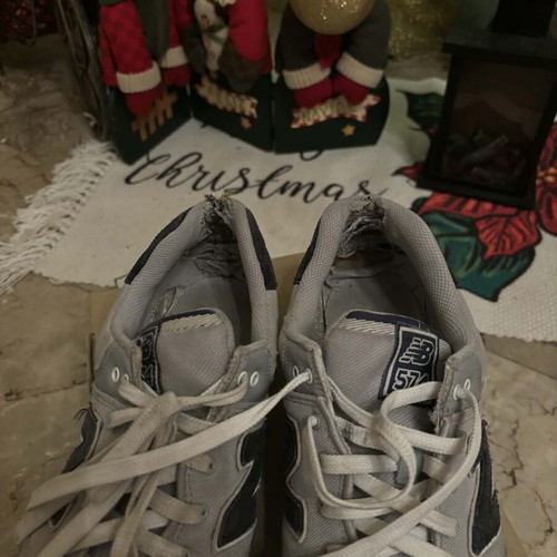 New Balance 574 used gray sneakers size 44.5 with wear inside
