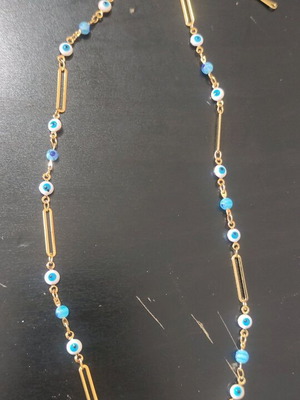 Steel necklace new, blue and gold color