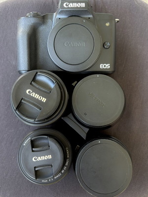 Canon EOS M50 mirrorless camera kit with lenses and tripod
