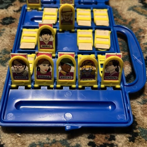 Guess Who? Pocket board game used