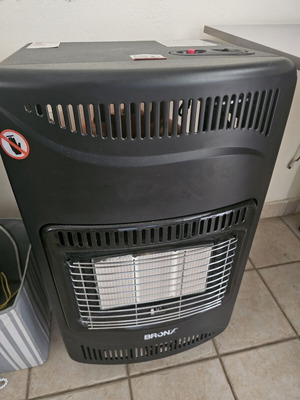 Heater used with bottle of gas