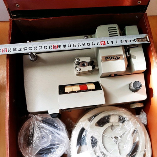 Russian projector used with leather case and film