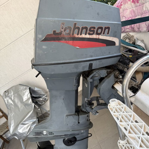 Johnson 70 hp outboard motor used with accessories