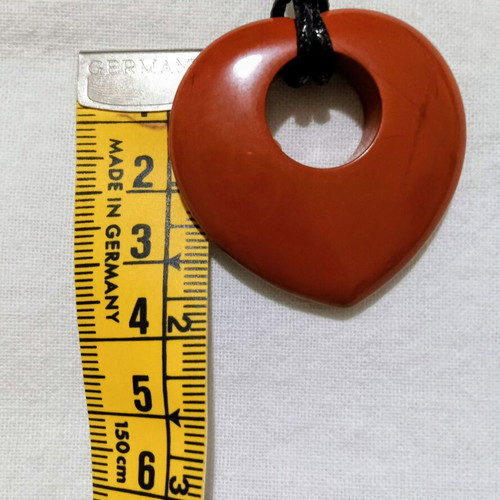 Semiprecious stone pendant with red jasper heart donut shape
