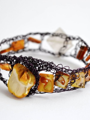 Woven bracelet with purple wire and yellow mother of pearl beads made to order