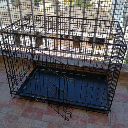 Pet crate used, size M, black with 2 doors