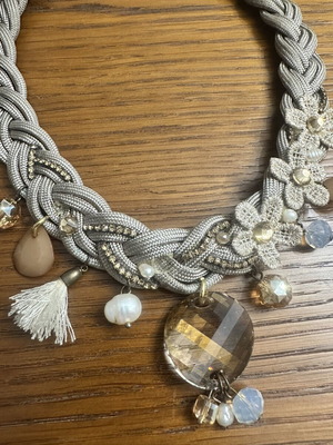 Handmade statement necklace with grey braided cord and fabric flowers