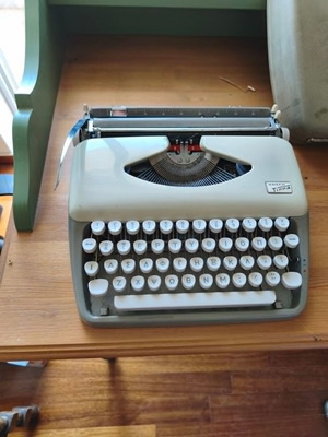 Olympia Traveller vintage typewriter with Greek keyboard and case used