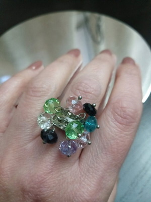 Ring with Swarovski stones and silver beads like new, multicolored