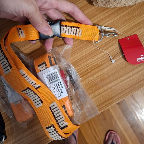 Puma keychains new, set of 5, orange and black