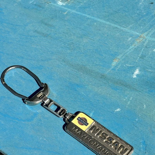 Nissan Maxima Vintage Metal Keychain used, 5.1 cm