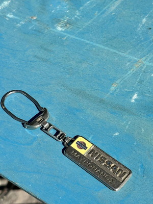 Nissan Maxima Vintage Metal Keychain used, 5.1 cm