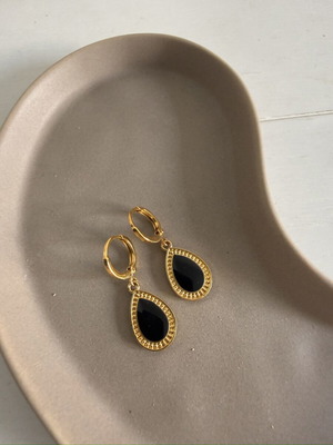 Earrings with black enamel like new, gold color