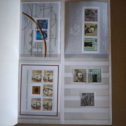 Vintage leather-bound stamp album with German stamps like new