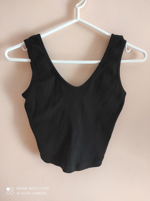Black cotton top like new, sizes XS and S, open back