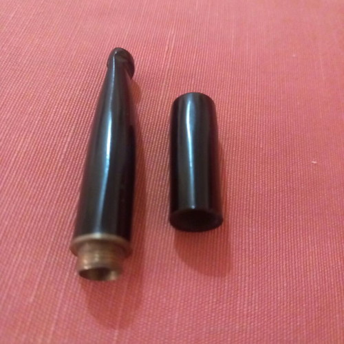 Cigarette holder used for regular cigarettes, not slim