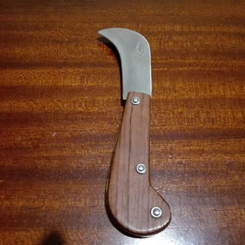 Traditional village folding knife like new with wooden handle