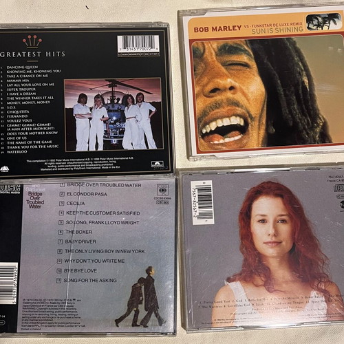 Pack of 4 used CDs with ABBA Gold, Simon & Garfunkel, Tori Amos