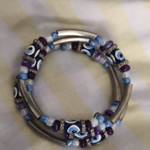 Spiral Bracelet with Evil Eye Beads like new, blue and purple