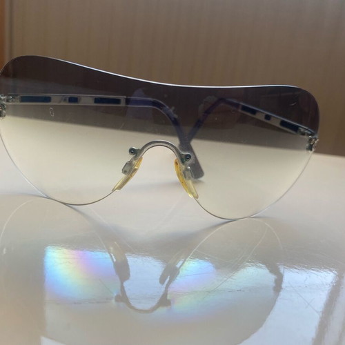 Chanel rimless sunglasses used with scratches on lenses